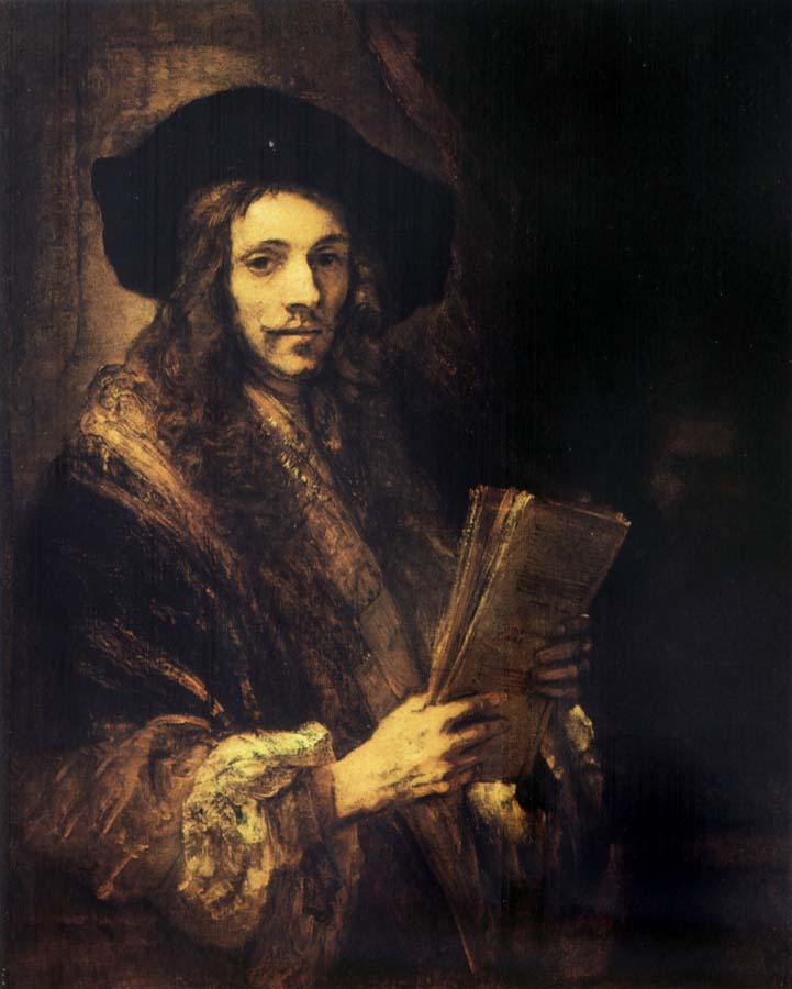 Portrait of a young madn holding a book